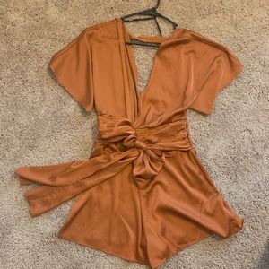 Silky burnt orange romper with tie waist